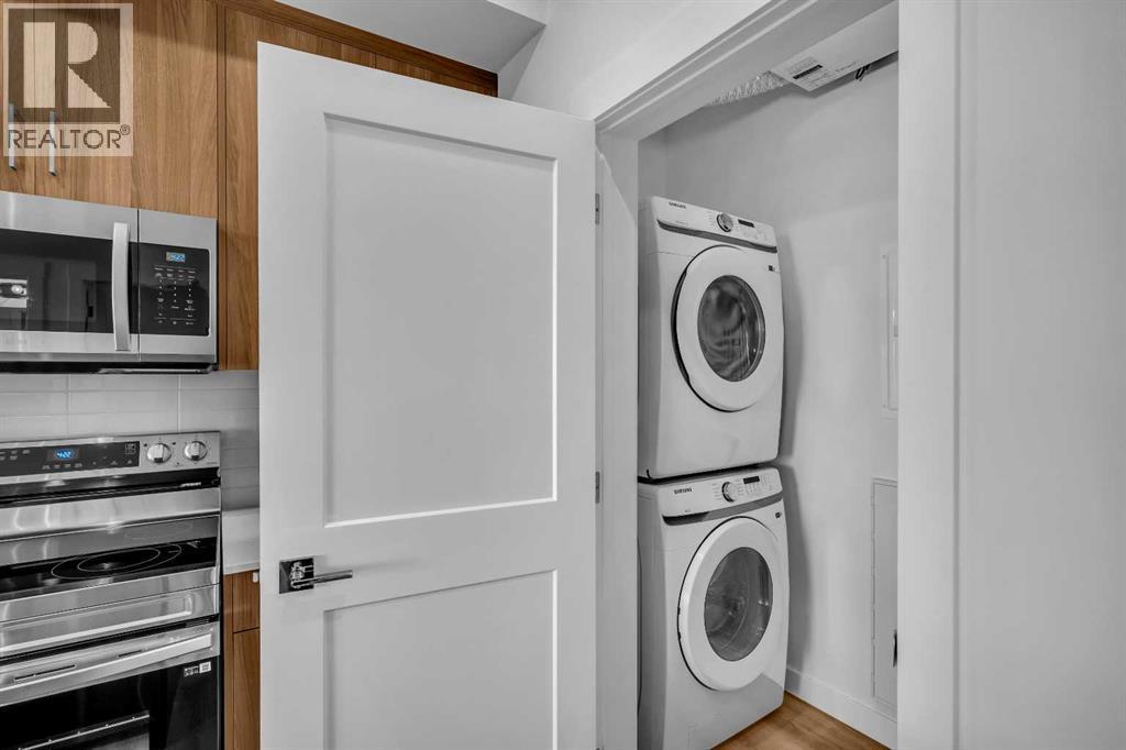 in unit laundry - 7209, 1802 Mahogany Boulevard, Calgary, AB - Indoor Photo Showing Laundry Room