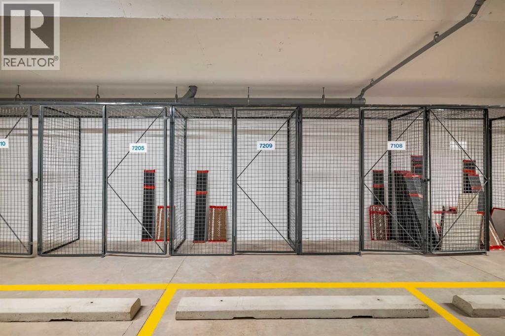 underground titledparking - 7209, 1802 Mahogany Boulevard, Calgary, AB - Indoor Photo Showing Garage