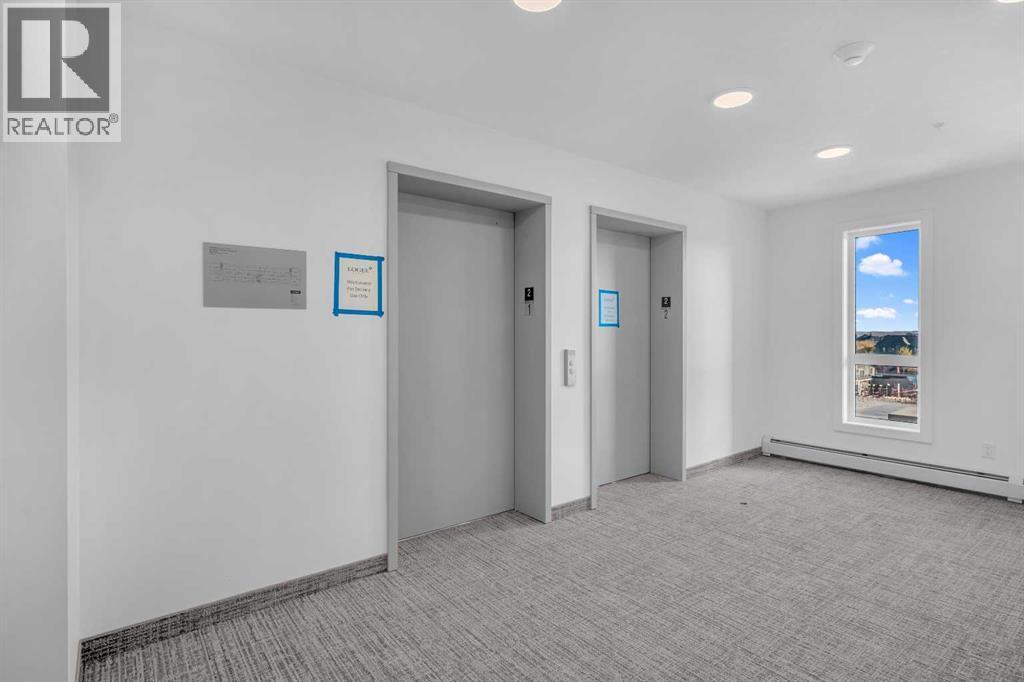 7209, 1802 Mahogany Boulevard, Calgary, AB - Indoor Photo Showing Other Room