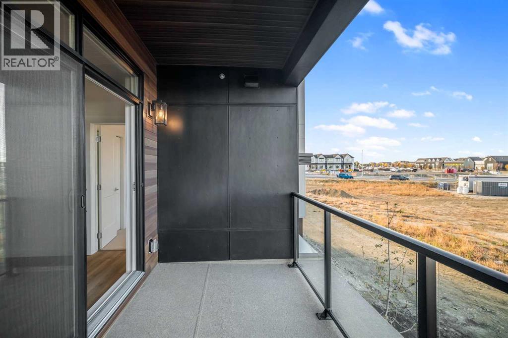 Large balcony with attached natural gas bbq line - 7209, 1802 Mahogany Boulevard, Calgary, AB - Outdoor With Balcony With Exterior