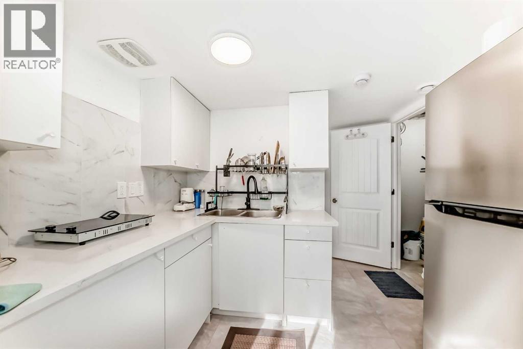 8 Cityscape Boulevard Ne, Calgary, AB - Indoor Photo Showing Kitchen With Double Sink