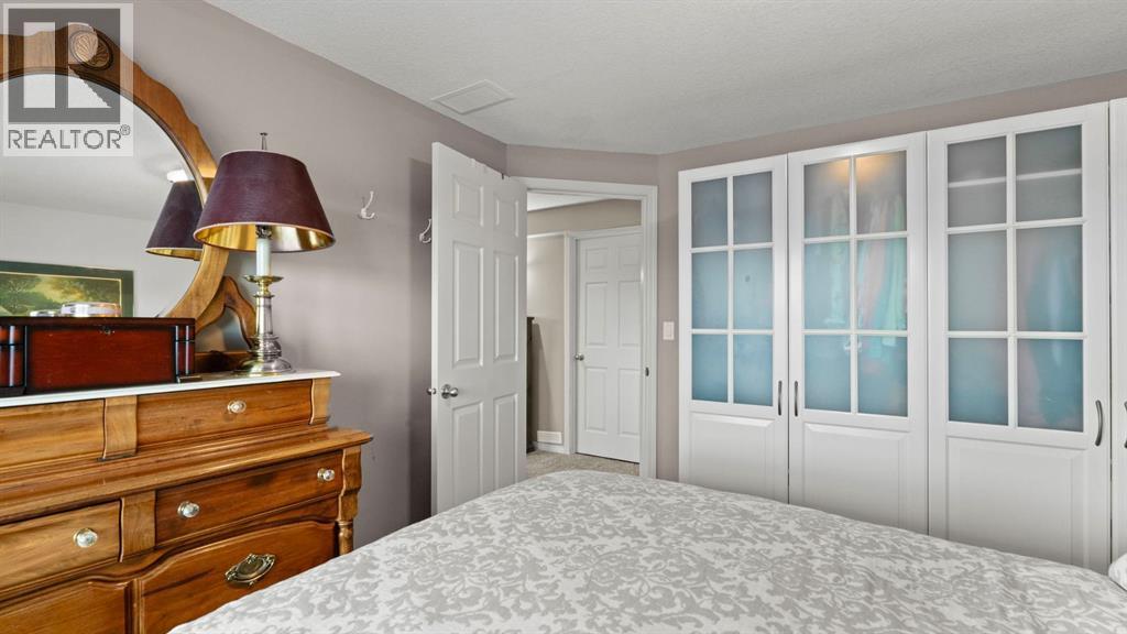 166 Bridlecrest Boulevard Sw, Calgary, AB - Indoor Photo Showing Bedroom