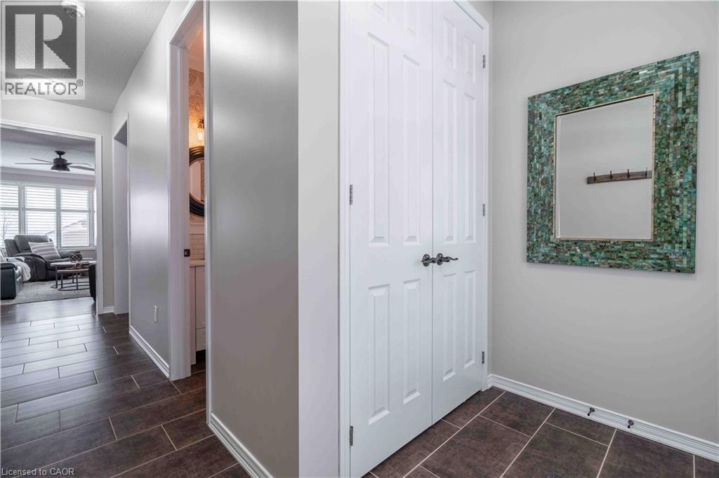 Elegant, spacious front hall way from foyer entry to main living space. Ample front closet. - 115 Larry Crescent, Caledonia, ON - Indoor Photo Showing Other Room