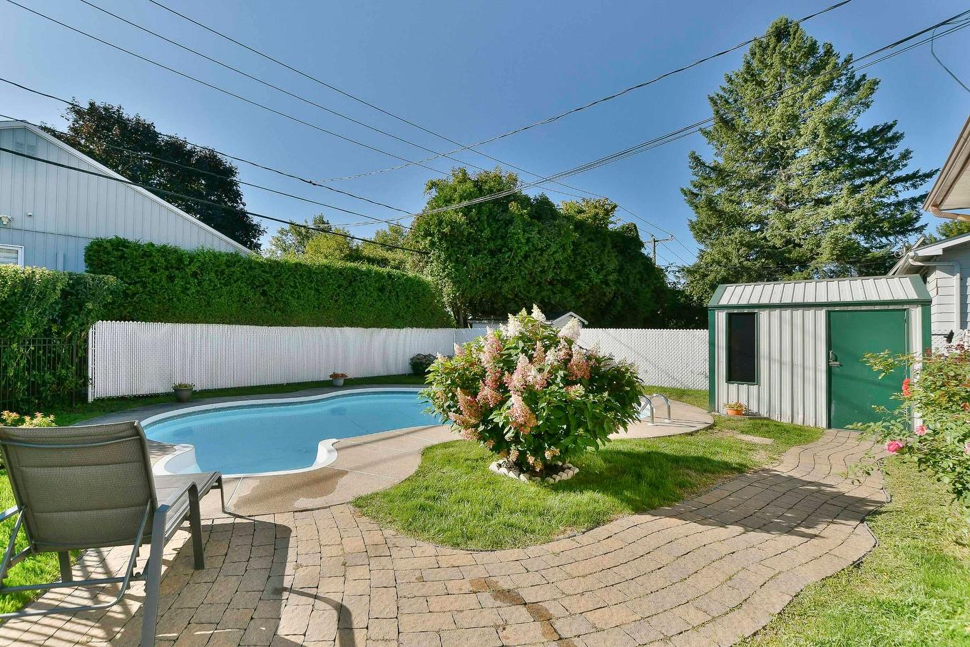 Backyard - 3950 Rue Nathalie, Laval (Fabreville), QC - Outdoor With In Ground Pool With Deck Patio Veranda