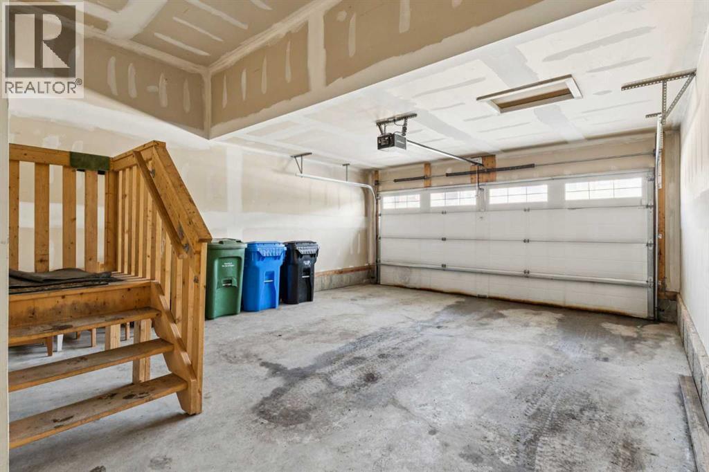 116 Walden Parade Se, Calgary, AB - Indoor Photo Showing Garage