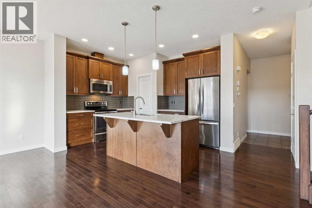 116 Walden Parade Se, Calgary, AB - Indoor Photo Showing Kitchen With Upgraded Kitchen
