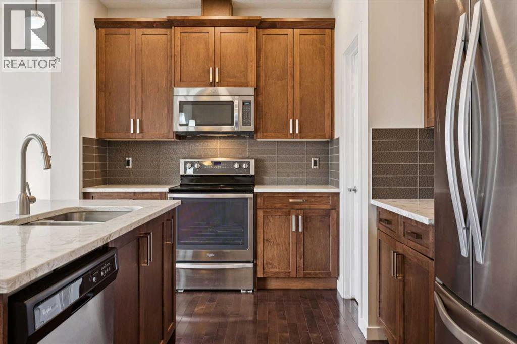 116 Walden Parade Se, Calgary, AB - Indoor Photo Showing Kitchen With Double Sink With Upgraded Kitchen