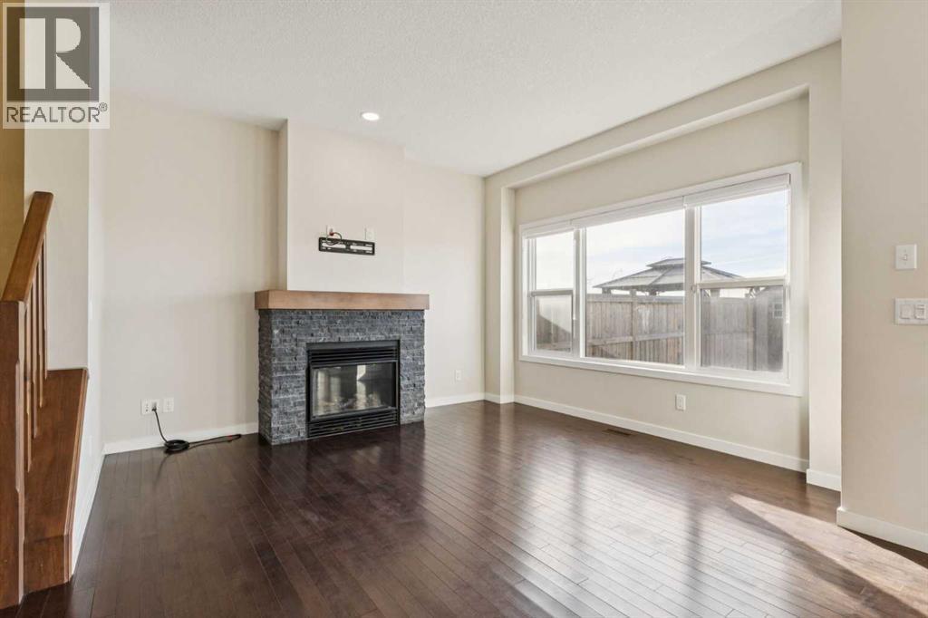 116 Walden Parade Se, Calgary, AB - Indoor Photo Showing Living Room With Fireplace
