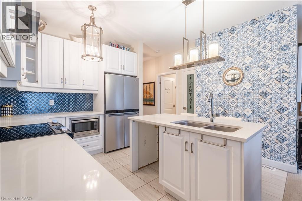 7 Comet Lane, Crystal Beach, ON - Indoor Photo Showing Kitchen With Stainless Steel Kitchen With Double Sink With Upgraded Kitchen