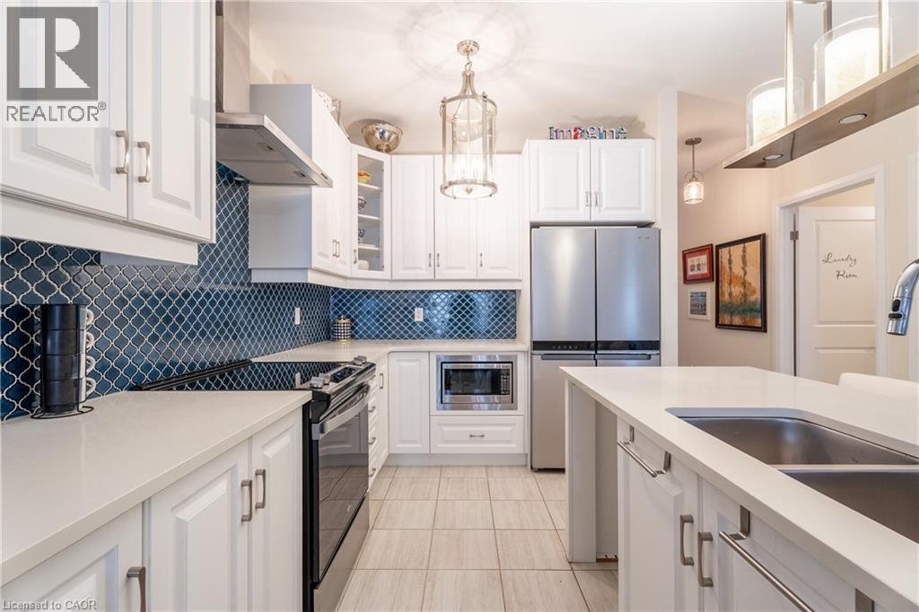 7 Comet Lane, Crystal Beach, ON - Indoor Photo Showing Kitchen With Stainless Steel Kitchen With Double Sink With Upgraded Kitchen