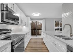 updated kitchen with quartz counters -