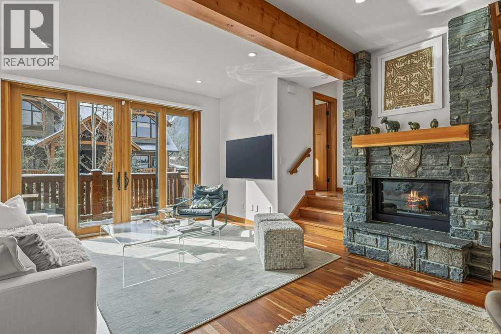 4, 511 6Th Avenue, Canmore, AB - Indoor Photo Showing Living Room With Fireplace