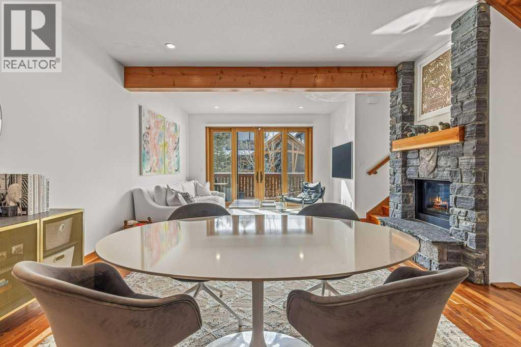 4, 511 6Th Avenue, Canmore, AB - Indoor Photo Showing Living Room With Fireplace