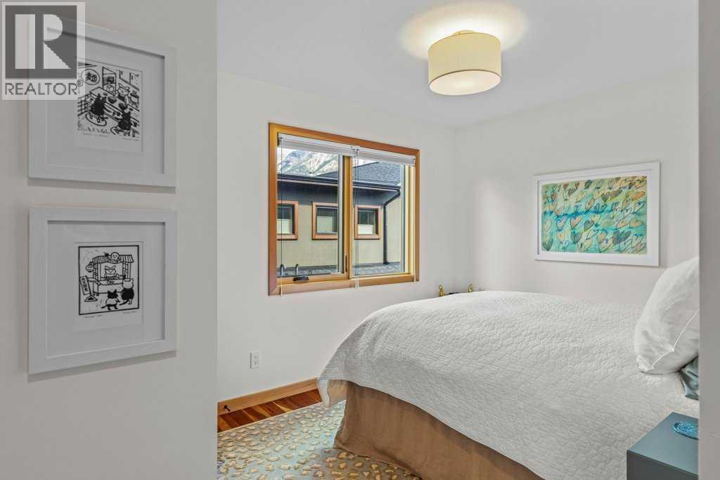 4, 511 6Th Avenue, Canmore, AB - Indoor Photo Showing Bedroom