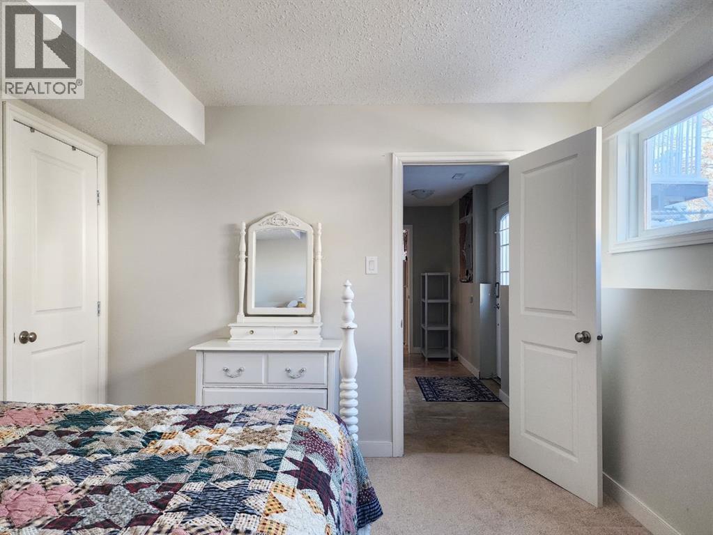 310 54 Avenue E, Claresholm, AB - Indoor Photo Showing Bedroom