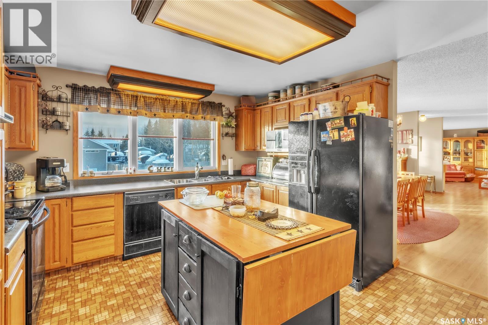 178 4Th Street E, Pierceland, SK - Indoor Photo Showing Kitchen With Double Sink
