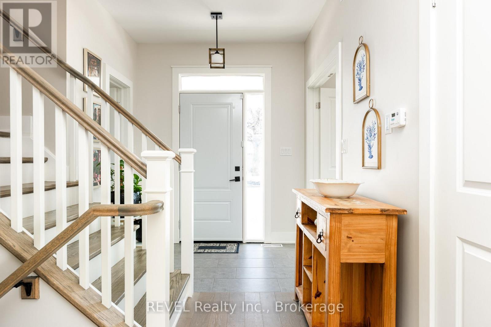 The front door entrance of the home. - 1 Princeton Common Street, St. Catharines (Lakeport), ON