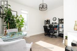 The main floor den currently used as an office. -