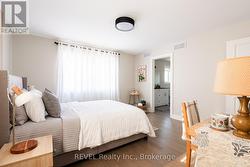 The room offers bright double aspect windows. -