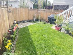 The fully fenced backyard space. -