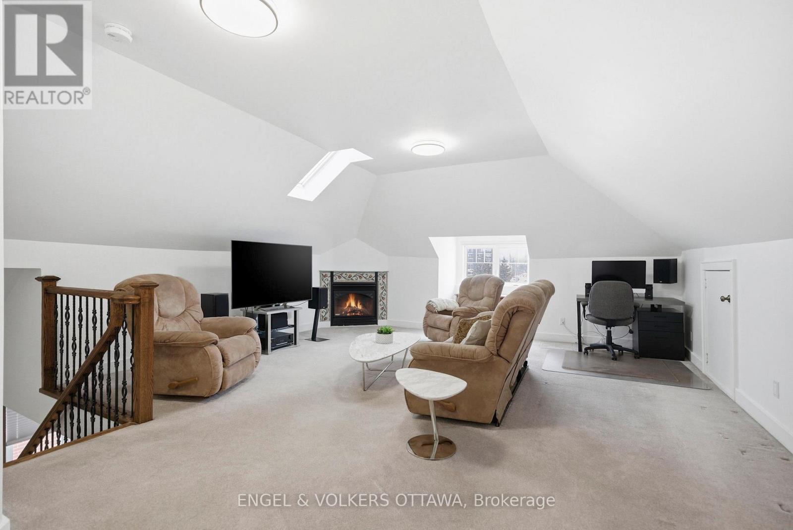 405 Echo Dr. Upstairs loft - 407 Echo Drive, Ottawa, ON - Indoor Photo Showing Other Room With Fireplace