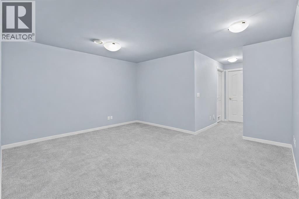 103 Masters Heights Se, Calgary, AB - Indoor Photo Showing Other Room