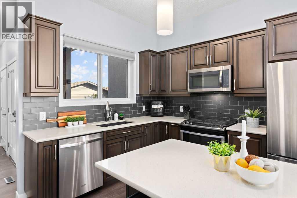 103 Masters Heights Se, Calgary, AB - Indoor Photo Showing Kitchen With Upgraded Kitchen