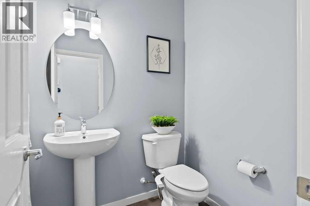Main floor powder room - 103 Masters Heights Se, Calgary, AB - Indoor Photo Showing Bathroom