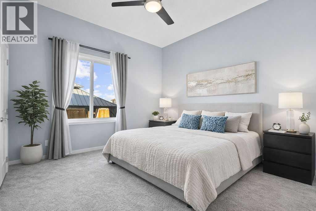 Primary bedroom - 103 Masters Heights Se, Calgary, AB - Indoor Photo Showing Bedroom