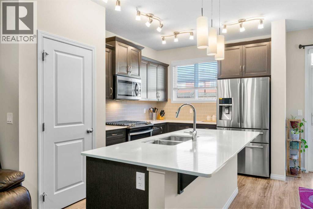 50 Legacy Glen Common Se, Calgary, AB - Indoor Photo Showing Kitchen With Double Sink With Upgraded Kitchen