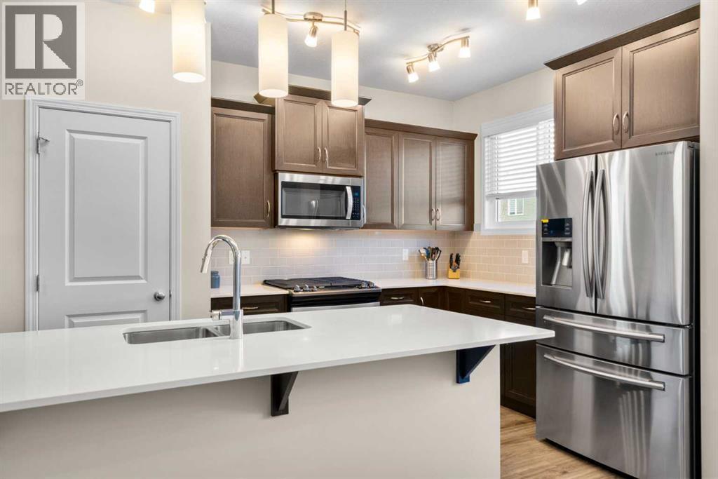 50 Legacy Glen Common Se, Calgary, AB - Indoor Photo Showing Kitchen With Double Sink With Upgraded Kitchen