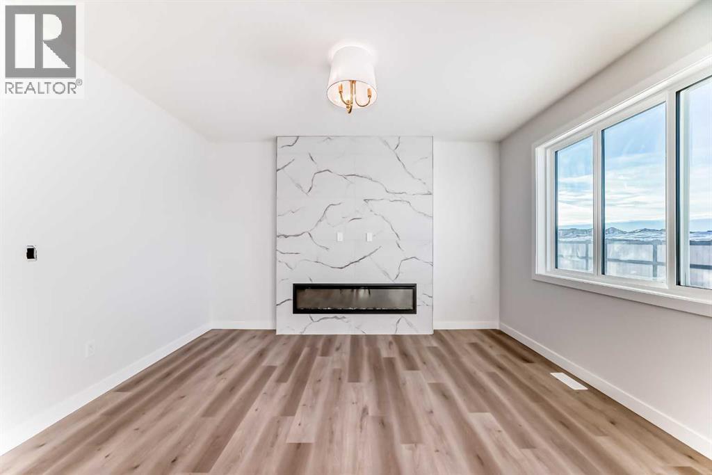 19 Lavelle Close, Red Deer, AB - Indoor With Fireplace