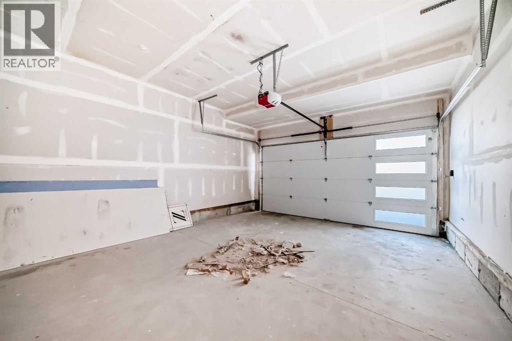 19 Lavelle Close, Red Deer, AB - Indoor Photo Showing Garage