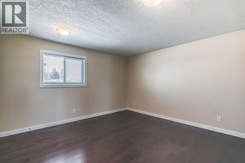 23 Cheltenham Road Nw, Calgary, AB - Indoor Photo Showing Other Room