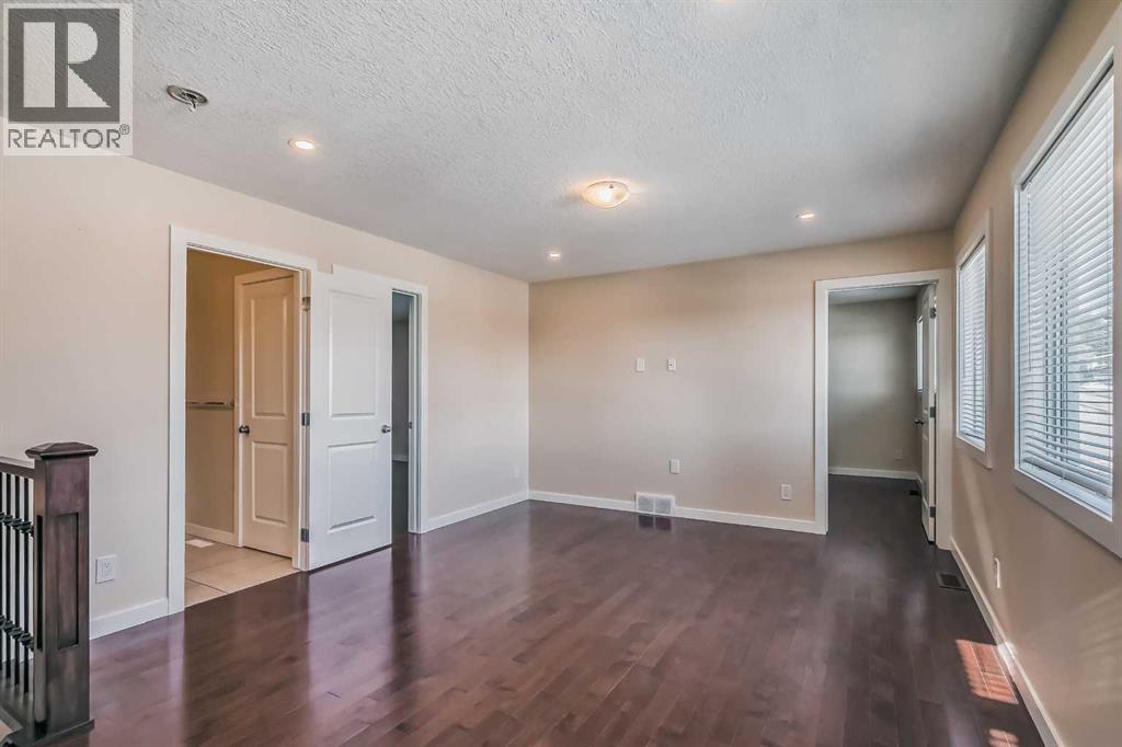 23 Cheltenham Road Nw, Calgary, AB - Indoor Photo Showing Other Room
