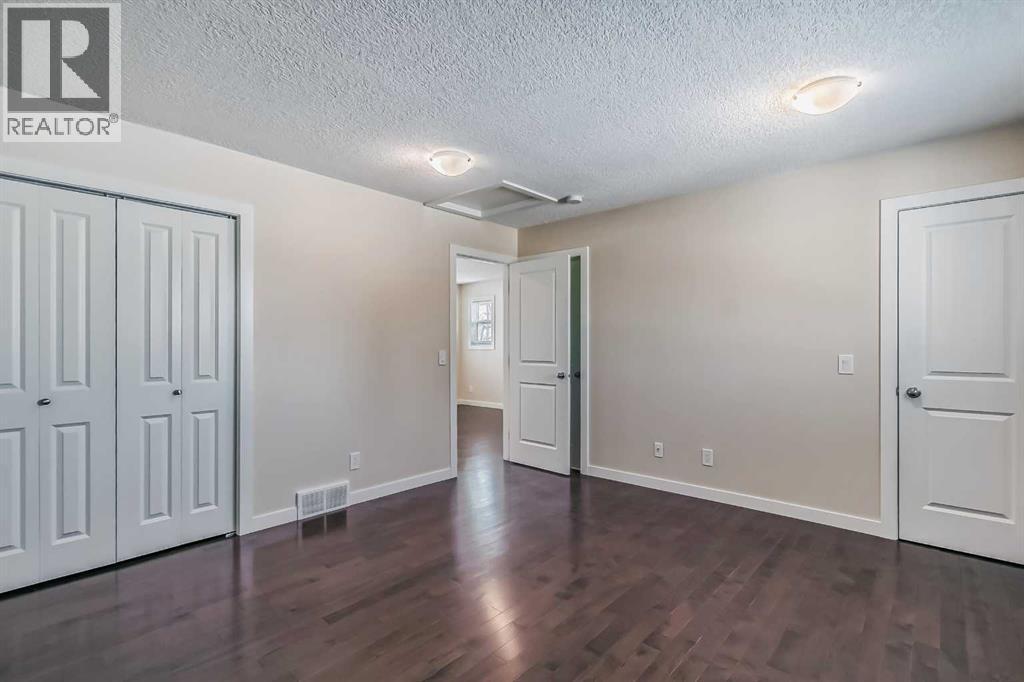 23 Cheltenham Road Nw, Calgary, AB - Indoor Photo Showing Other Room