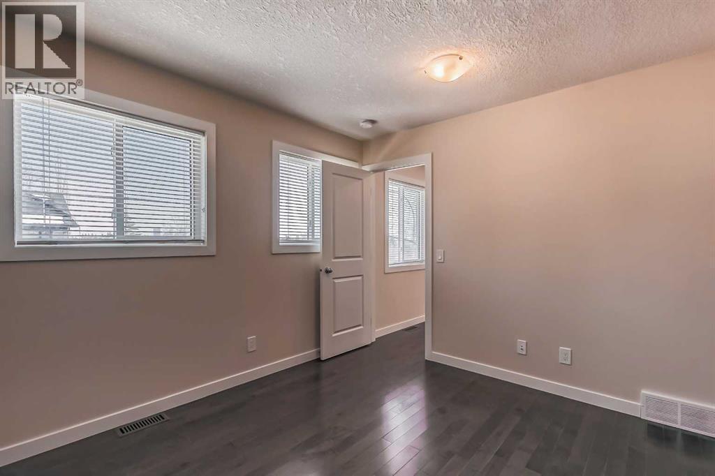 23 Cheltenham Road Nw, Calgary, AB - Indoor Photo Showing Other Room