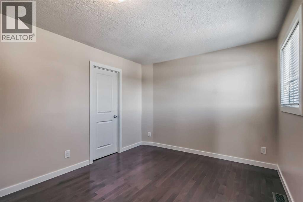 23 Cheltenham Road Nw, Calgary, AB - Indoor Photo Showing Other Room