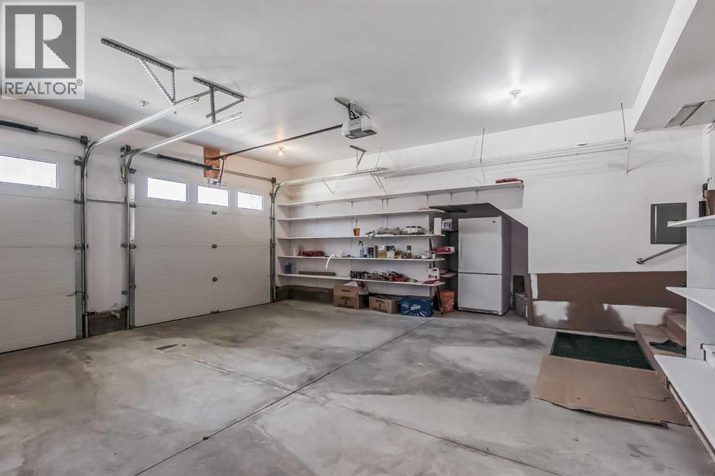 23 Cheltenham Road Nw, Calgary, AB - Indoor Photo Showing Garage