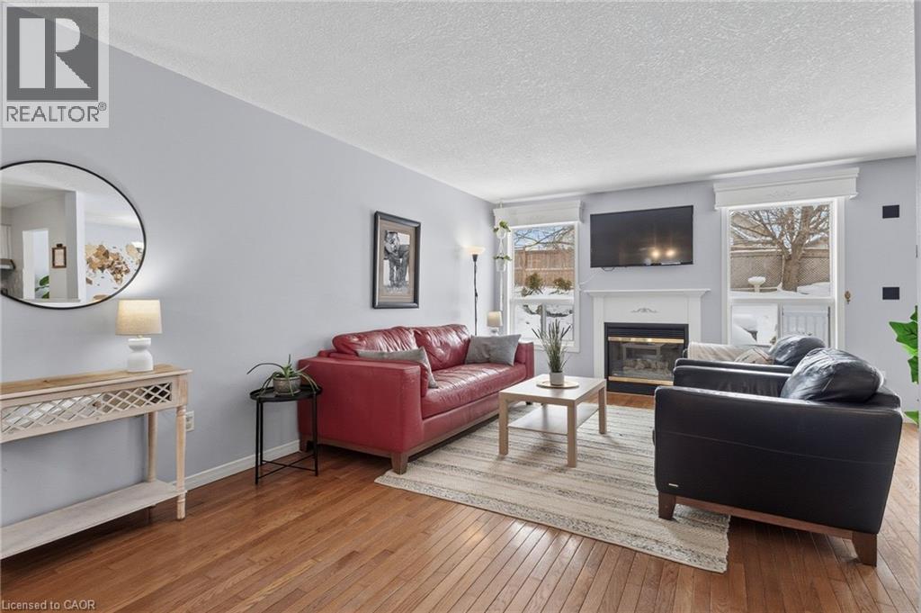 20 Endeavour Drive, Cambridge, ON - Indoor Photo Showing Living Room With Fireplace
