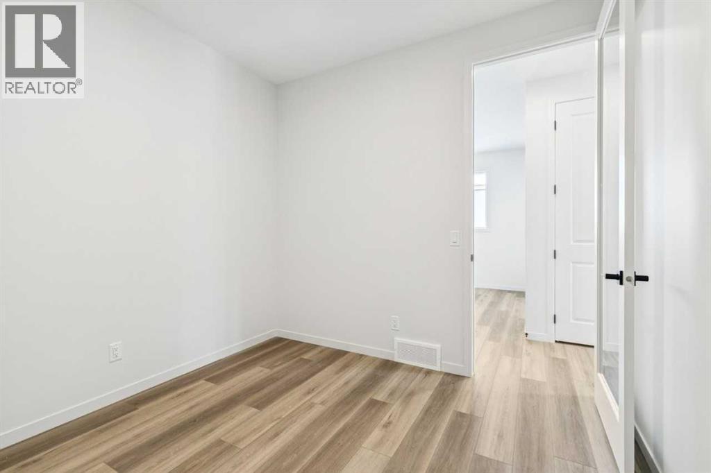 16 Calhoun Rise Ne, Calgary, AB - Indoor Photo Showing Other Room