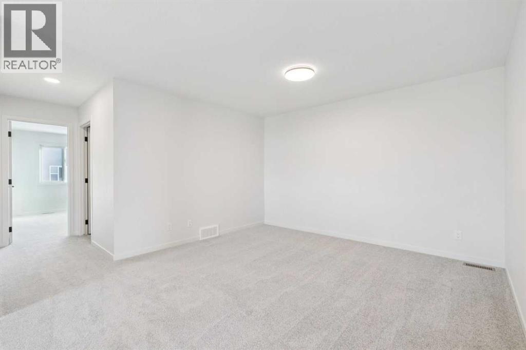 16 Calhoun Rise Ne, Calgary, AB - Indoor Photo Showing Other Room
