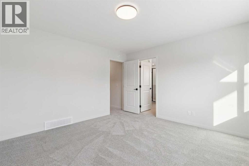 16 Calhoun Rise Ne, Calgary, AB - Indoor Photo Showing Other Room