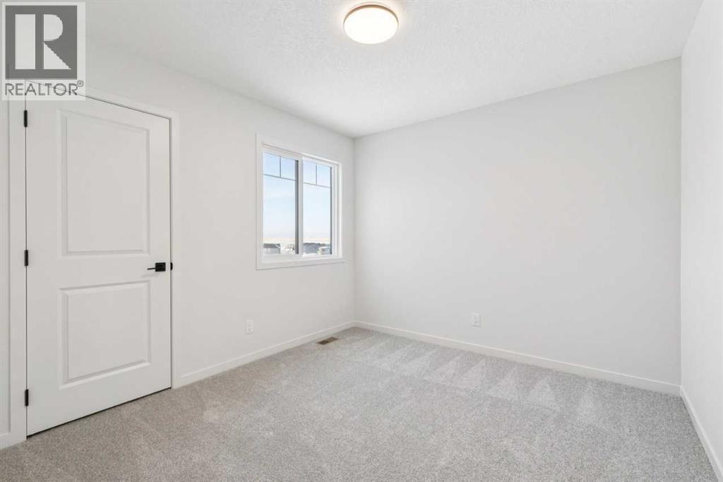 16 Calhoun Rise Ne, Calgary, AB - Indoor Photo Showing Other Room