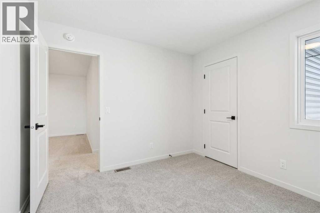 16 Calhoun Rise Ne, Calgary, AB - Indoor Photo Showing Other Room