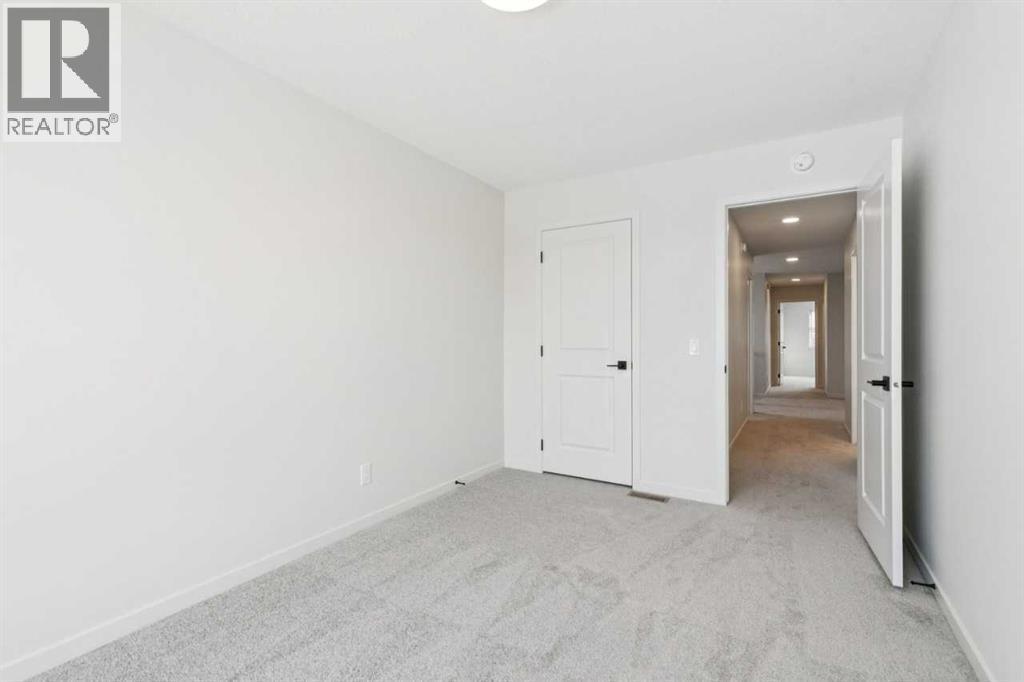 16 Calhoun Rise Ne, Calgary, AB - Indoor Photo Showing Other Room