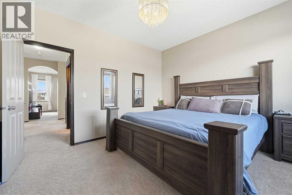 65 Elgin Meadows Circle Se, Calgary, AB - Indoor Photo Showing Bedroom
