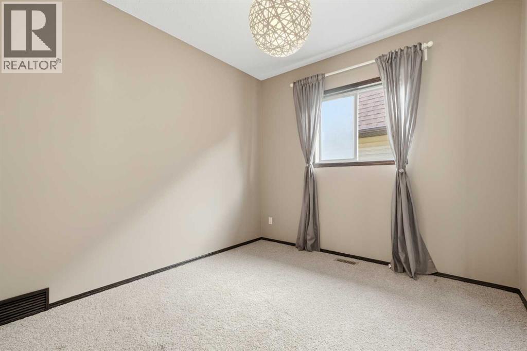 2nd Bedroom - 65 Elgin Meadows Circle Se, Calgary, AB - Indoor Photo Showing Other Room