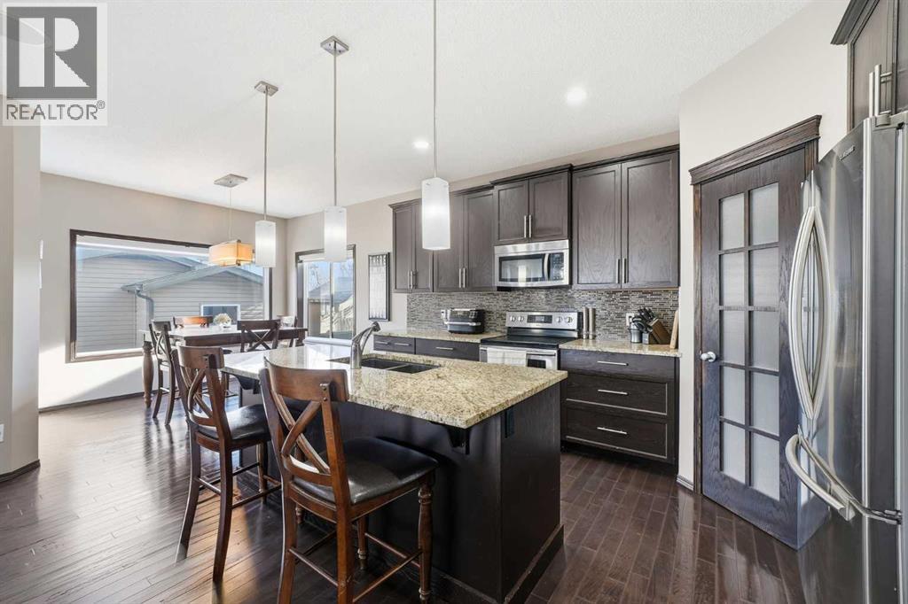 65 Elgin Meadows Circle Se, Calgary, AB - Indoor Photo Showing Kitchen With Stainless Steel Kitchen With Upgraded Kitchen