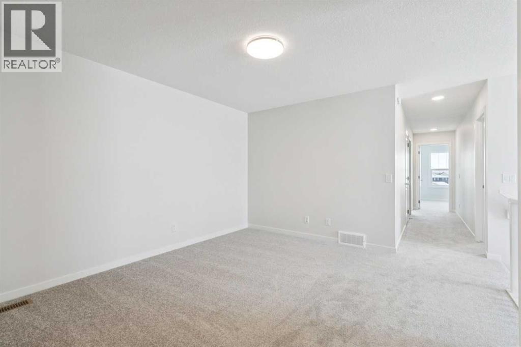28 Calhoun Rise Ne, Calgary, AB - Indoor Photo Showing Other Room